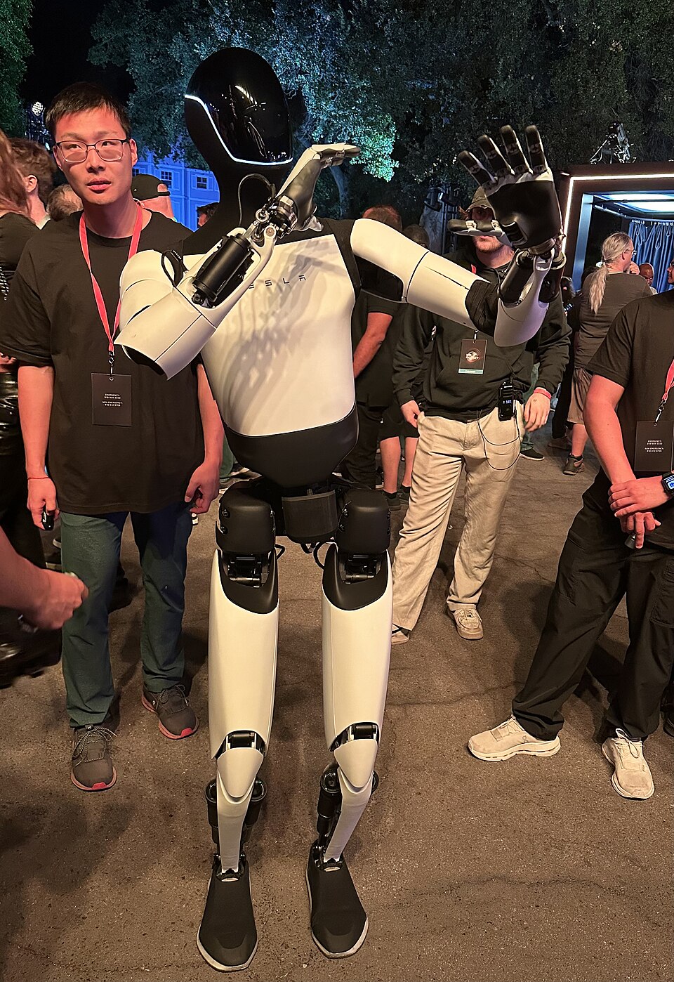 Optimus walking among guests, We Robot 2024